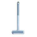 Multifunctional plastic cleaning brush with soft flannel head and extension handle for pet hair and dust.