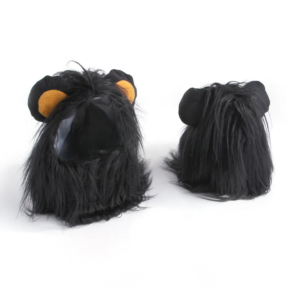 Black and white lion wig headgear for a cat, showing the soft polyester mane and elastic strap.