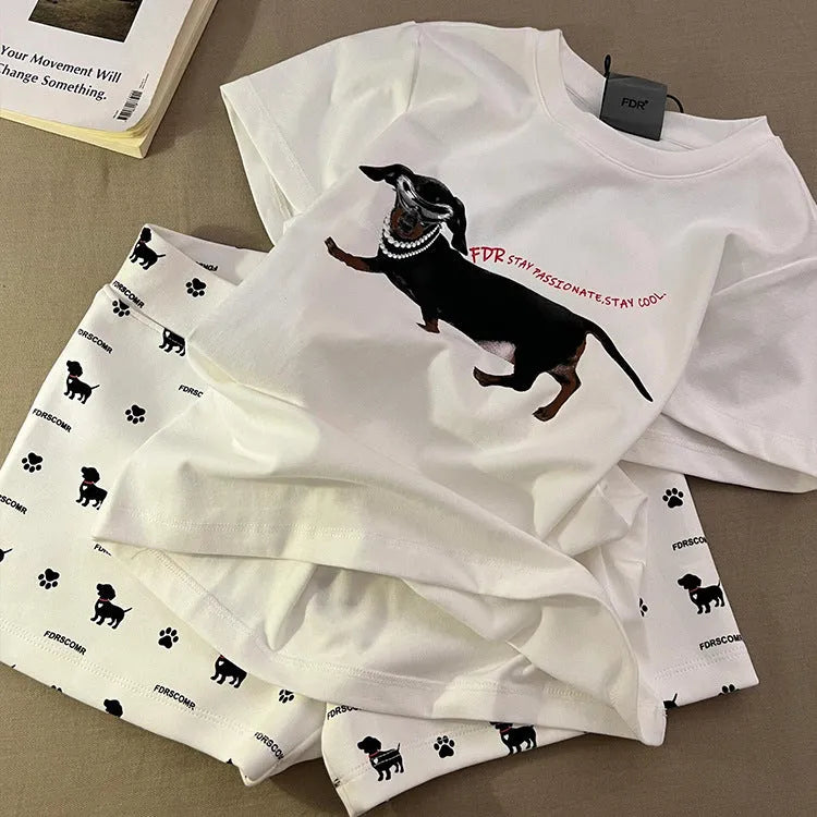 Girls short sleeve pyjama set with sausage dog print and sunglasses design in polyester