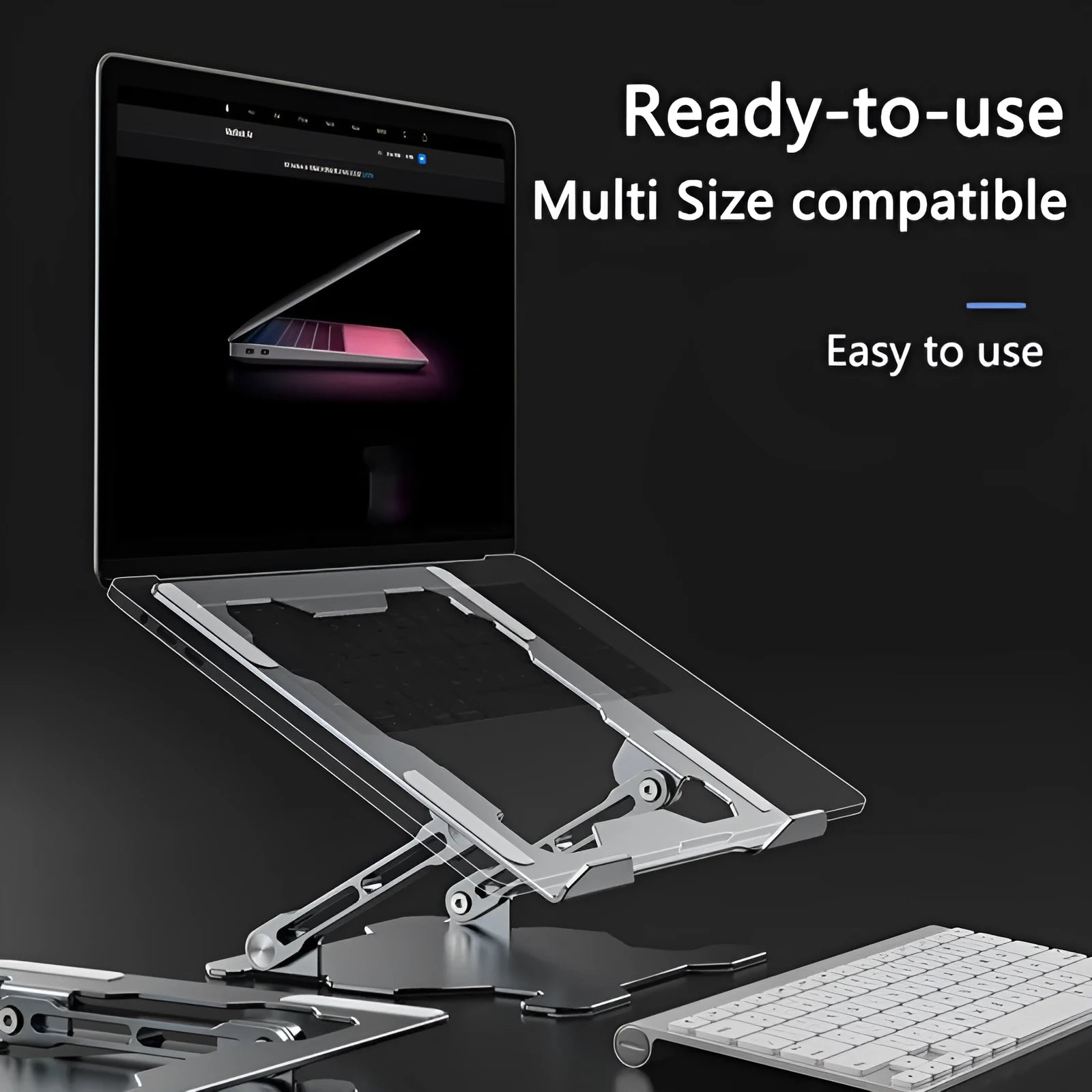 Grey aluminium laptop stand in a folded position next to an open laptop, showing its adjustable angle and hollow design.
