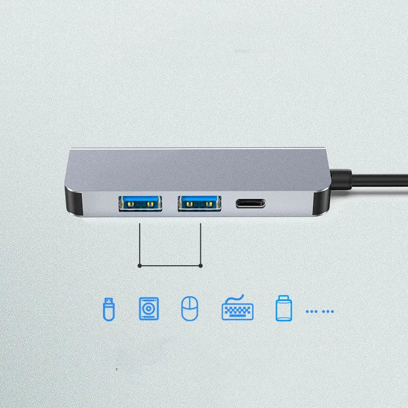 Compact aluminium four-in-one USB C hub with 4K HDMI, PD charging, USB, SD and TF card slots