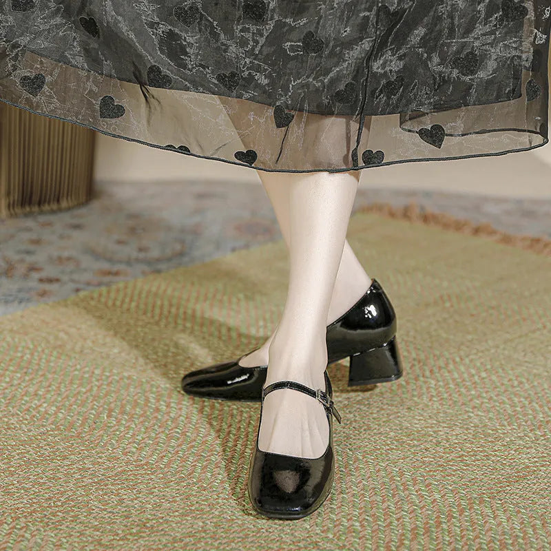 Women's square toe patent leather Mary Jane shoes with buckle and pearl detail, mid heel, black colour