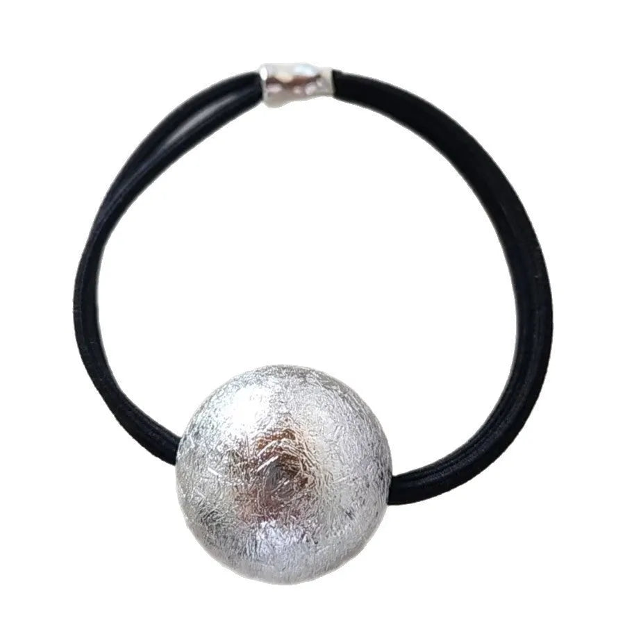 Resin hair band headdress with electroplated gold finish, round head rope style on a white background
