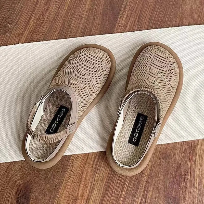 Beige Mori girl style slip-on shoes with a round toe and linen upper on a soft rubber sole.
