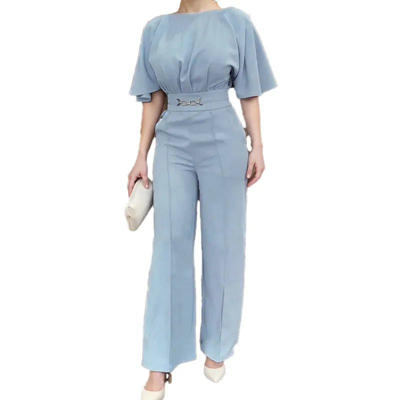 Blue men's two-piece polyester suit on a hanger, showing jacket and trousers.