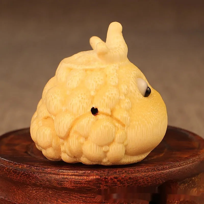 Solid bamboo hand-carved Crown Princess Toad ornament measuring 5.0 cm.