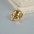 Stainless steel hollow skull and Buddha head geometric earrings in various electroplated colours.