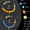 Two natural stone beaded bracelets showing different zodiac sign designs on a neutral background.