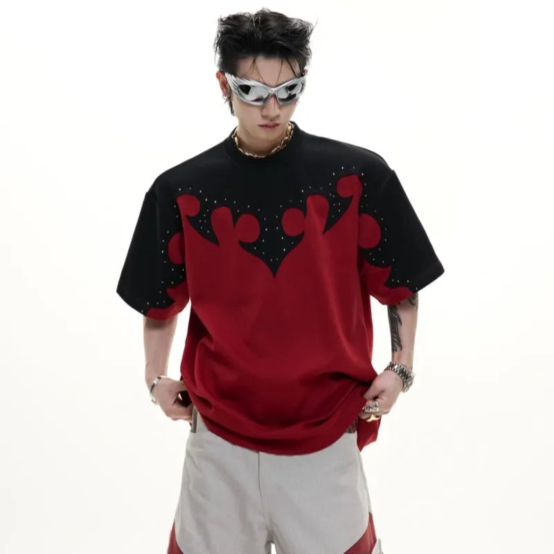 Grey loose-fit men's cotton shirt with short sleeves, drop shoulders, and a detailed burnt flower stitch pattern on the chest.