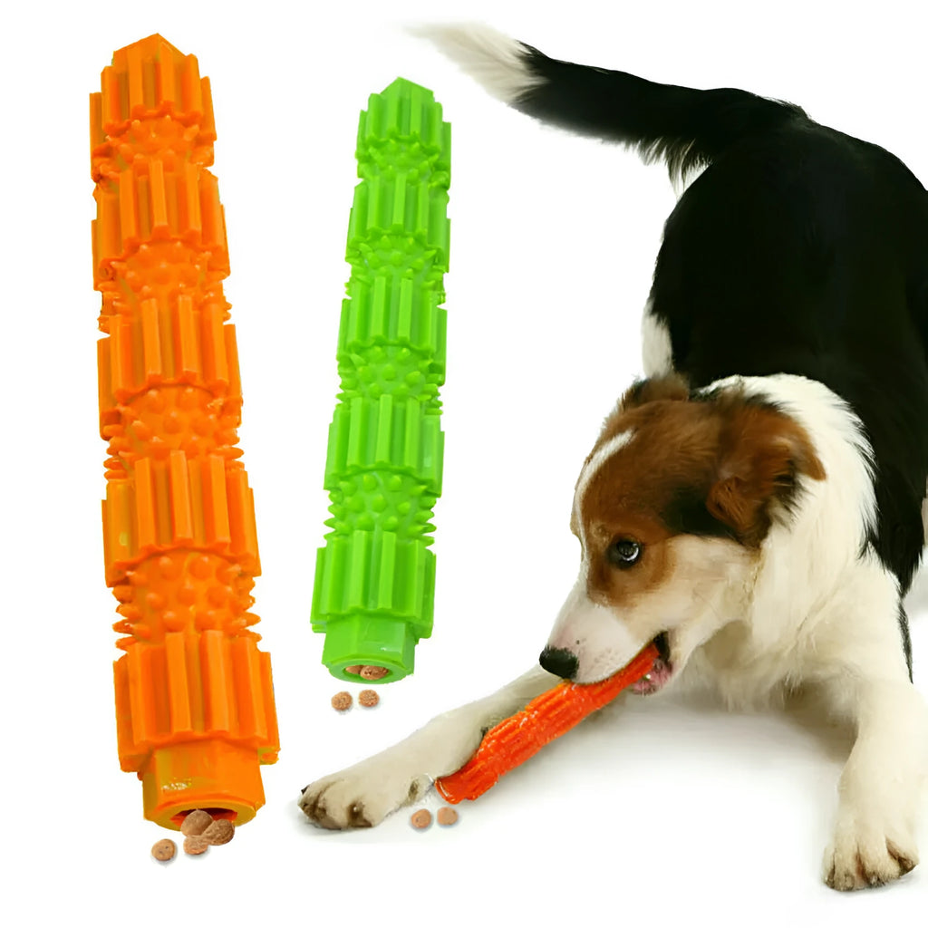 Green and orange rubber dog chew toy with treat dispensing compartment and squeaker for aggressive chewers