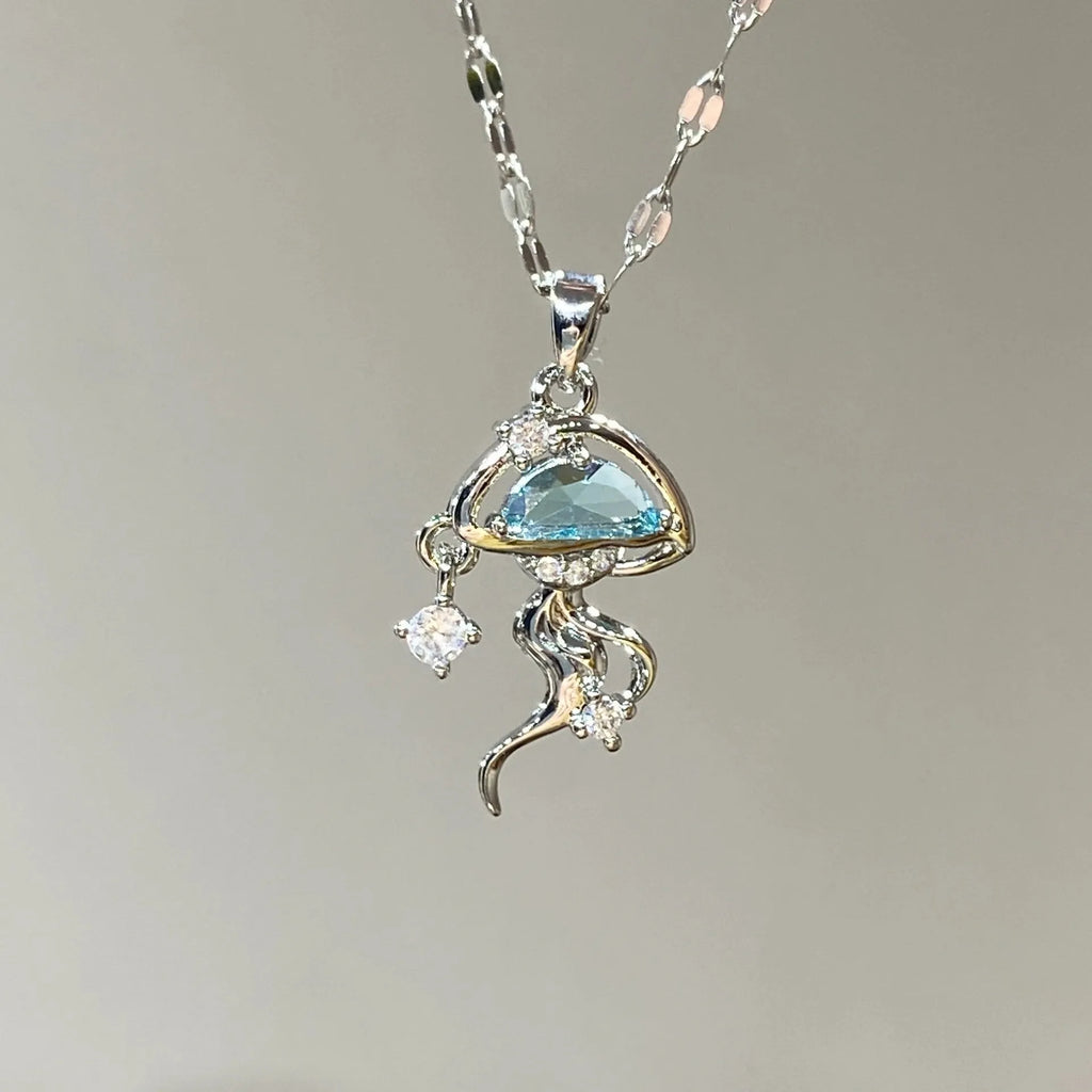 Blue jellyfish charm on sterling silver necklace with adjustable chain