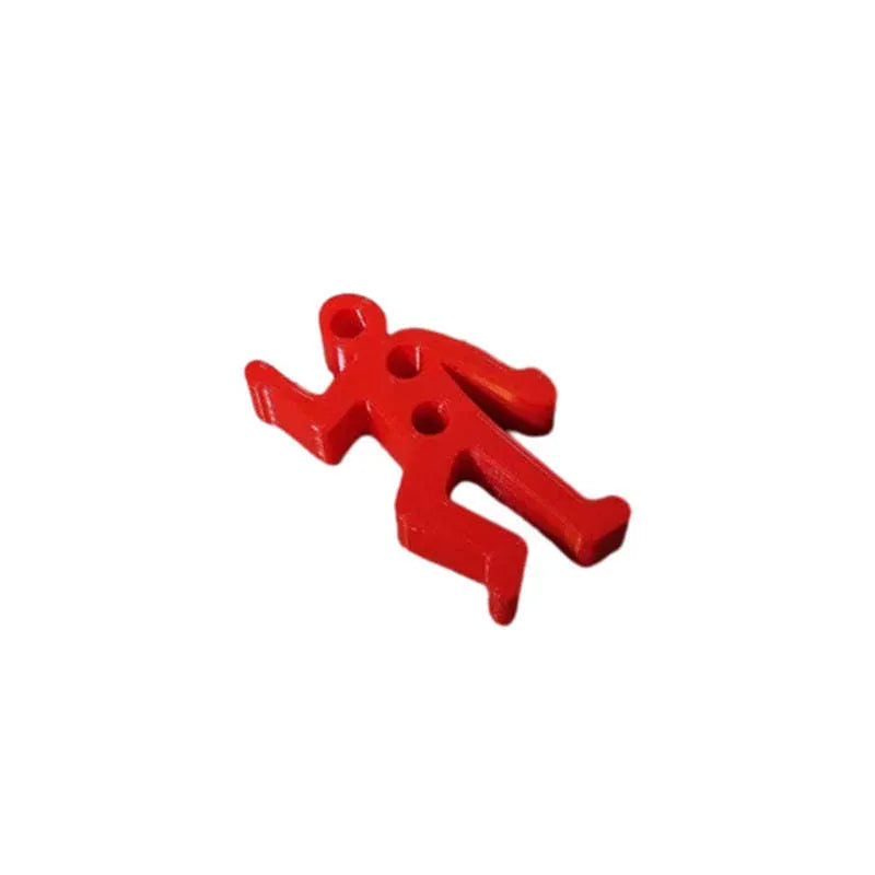 Funny crime scene humanoid pen holder in plastic, available in six colours, on a desk surface