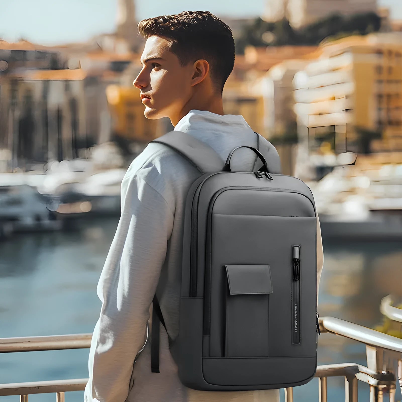 Lightweight Oxford cloth business travel backpack for men in dark grey colour with sewing line details