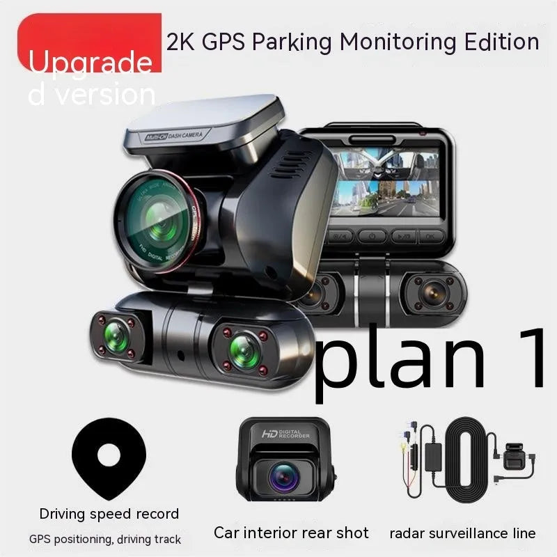 Black four-lens car dash cam with 2-inch screen mounted on a car windscreen.