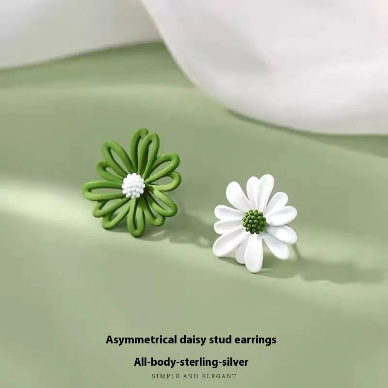 Two-tone flower stud earrings in blue and orange colour combination with cartoon floral design