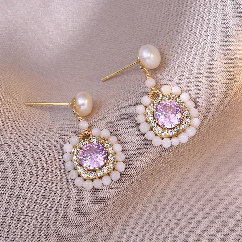 Natural freshwater pearl flower-shaped earrings in purple with diamond treatment finish