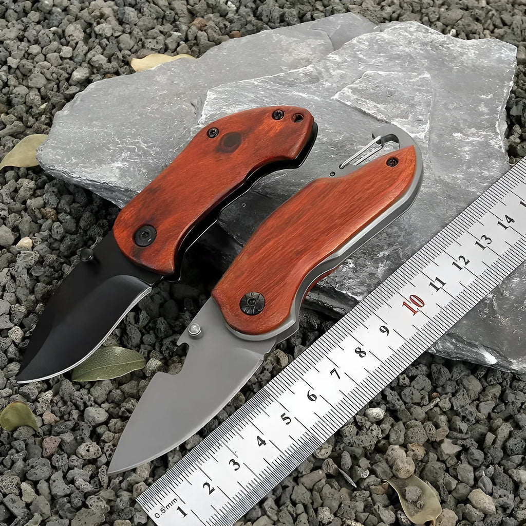 Stainless steel folding mini fruit knife with red handle and 5.5cm blade on keychain
