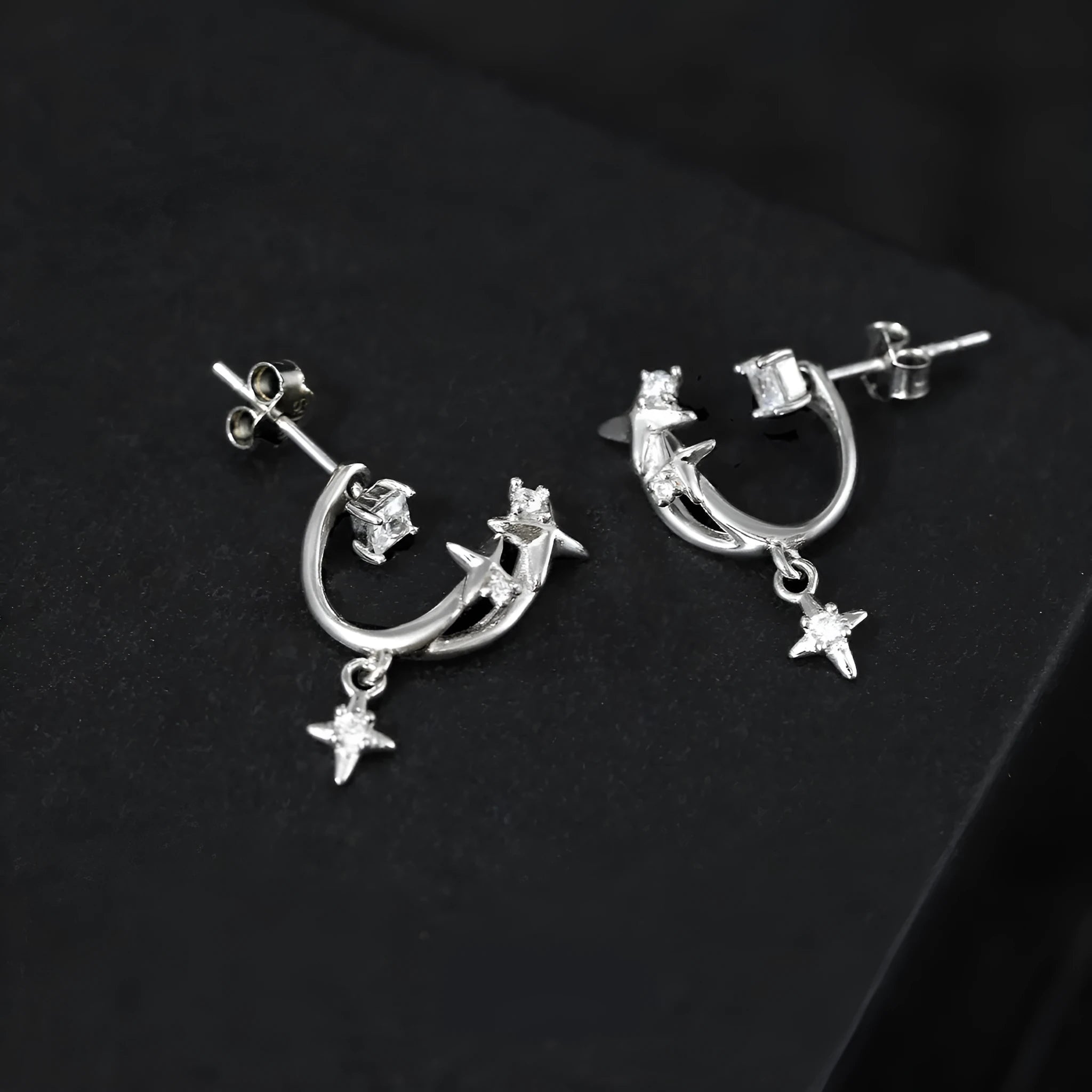 Track zircon ear studs in S925 sterling silver with white gold electroplate finish, star shape design for women