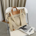 Canvas shoulder bag for women with letter print, large capacity, available in black, grey, white, khaki, and green colours