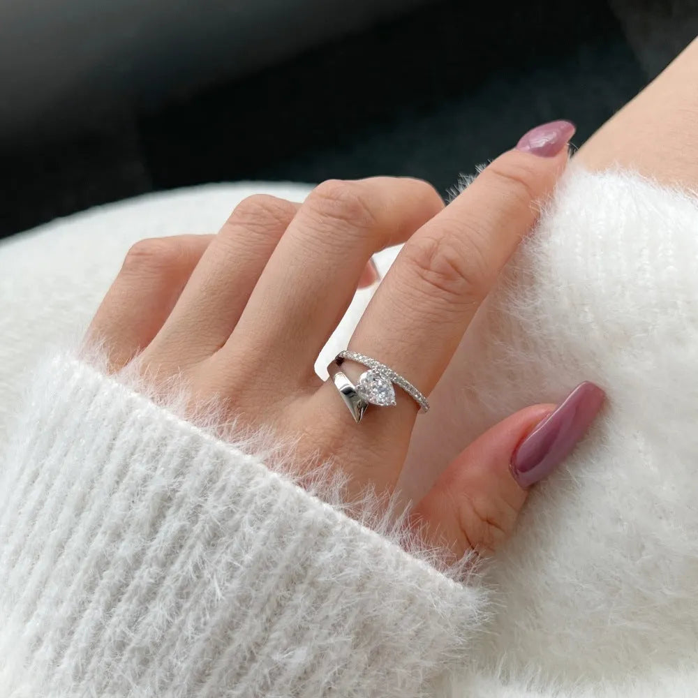 Women's silver water drop ring with electroplating and geometric teardrop design, shown in a listed colour option