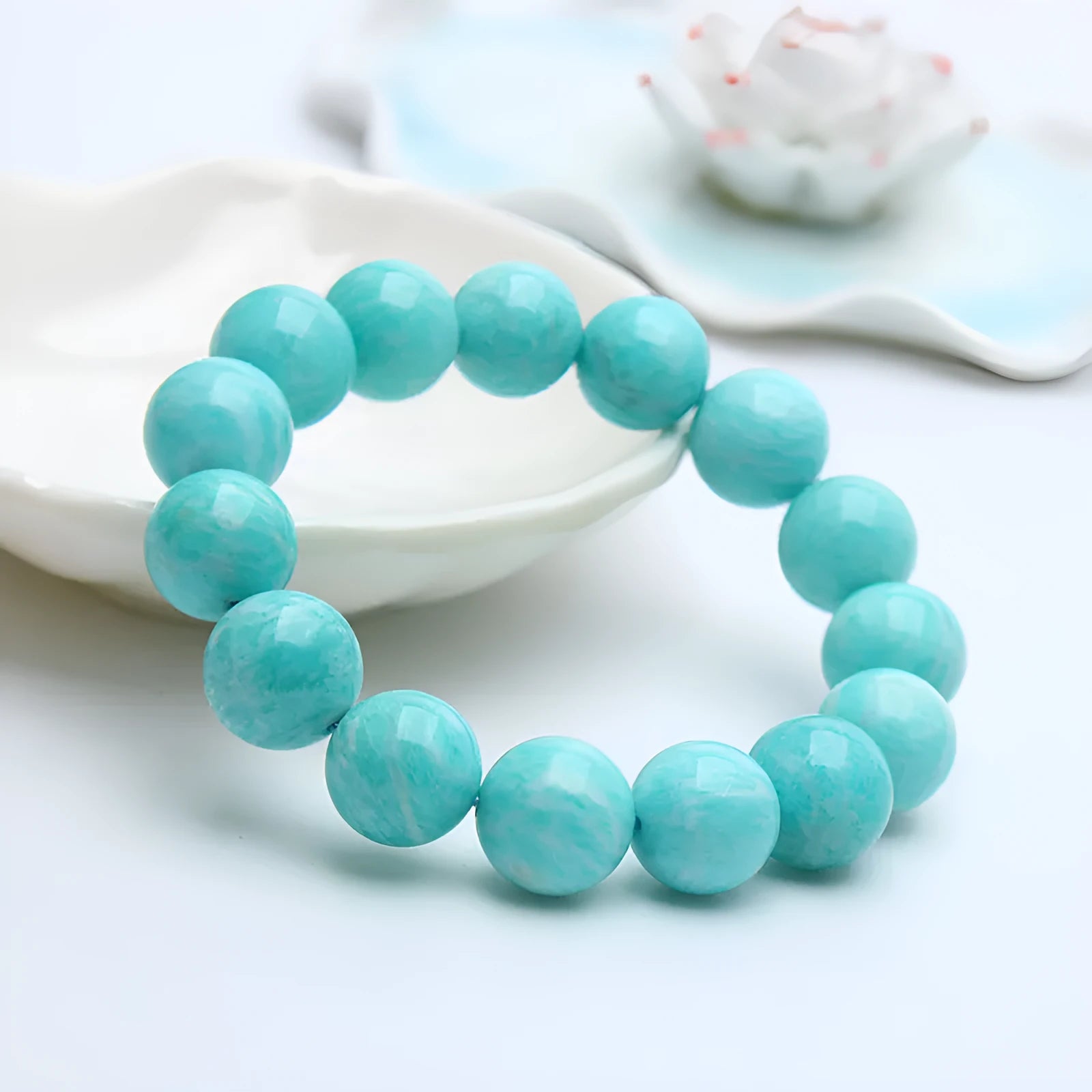 Amazonite gemstone bracelet showing natural blue-green beads in one of three available sizes: 8mm, 9mm or 10mm diameter