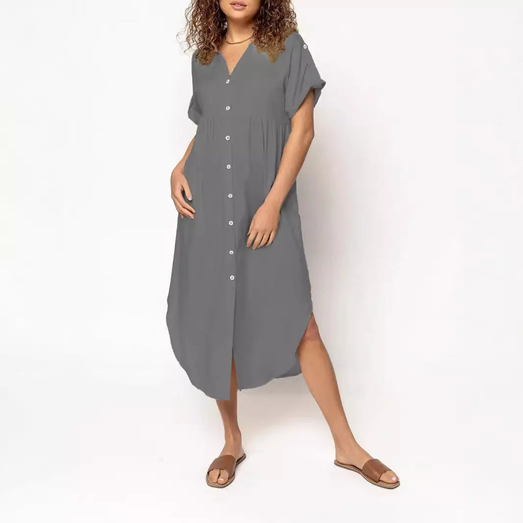 Loose-fitting casual midi dress with buttons down the front, shown in a solid colour.