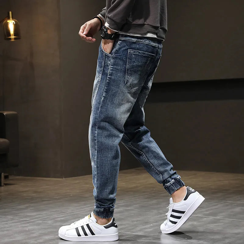 Men's plus size velvet stretch jeans in blue with slim fit and tether closure