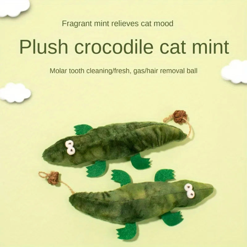 Green plush alligator-shaped cat toy with catnip and peppermint scent.