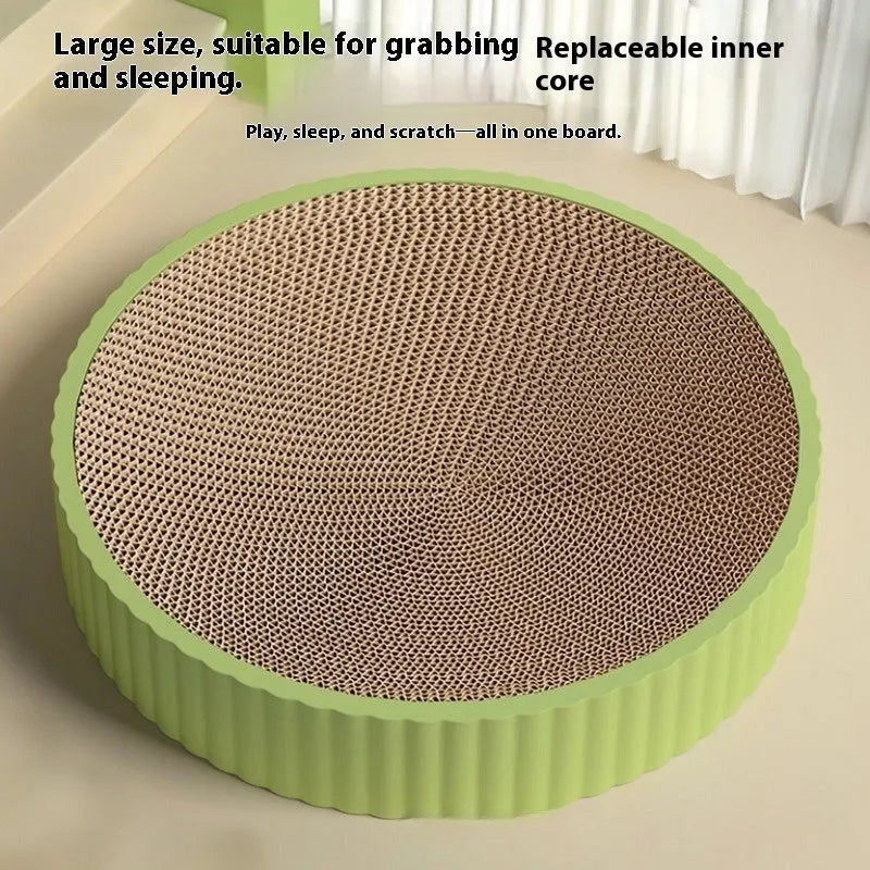 Green round cat scratching board made of corrugated cardboard, 55cm diameter.