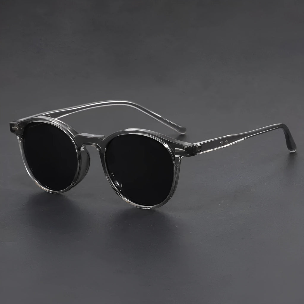 Ultra-light round frame sunglasses with oval lens in Sand Black colour