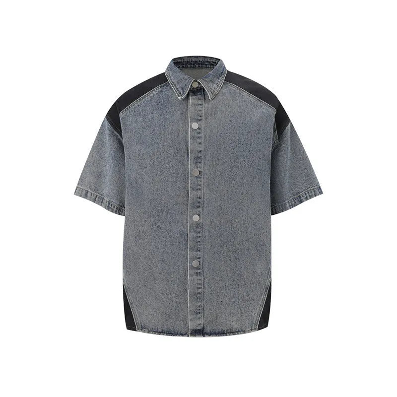 A retro-style washed denim suit featuring a short-sleeved jacket and full-length trousers on a mannequin.