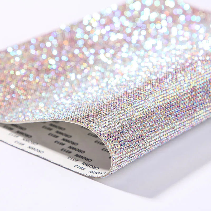 Rhinestone adhesive transfer sheet in eight-eyes pattern for hot drill application