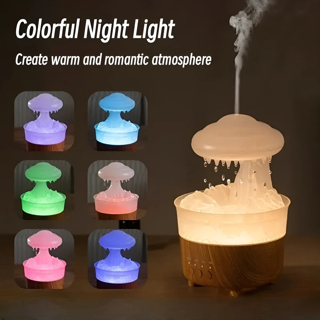 Wood grain white column-shaped rain cloud humidifier diffuser with LED night light on a table.