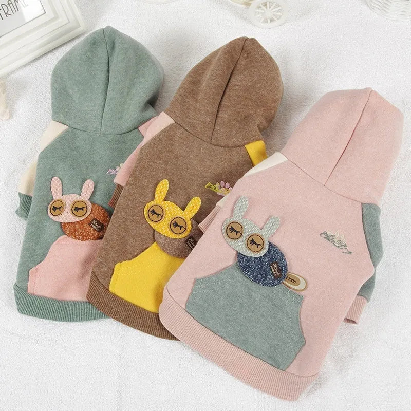 Brown cotton dog hoodie sweatshirt on a mannequin, showing hooded design.