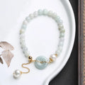 Handmade natural jade pearl bracelet with peace buckle design and geometry-shaped national style elements