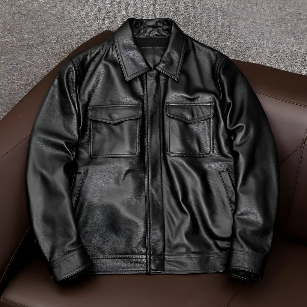 Men's plus size black retro lapel leather jacket with loose fit on hanger.