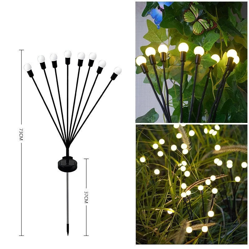 Solar-powered LED garden ground light with multiple light heads and a pneumatic foot pedal for installation.