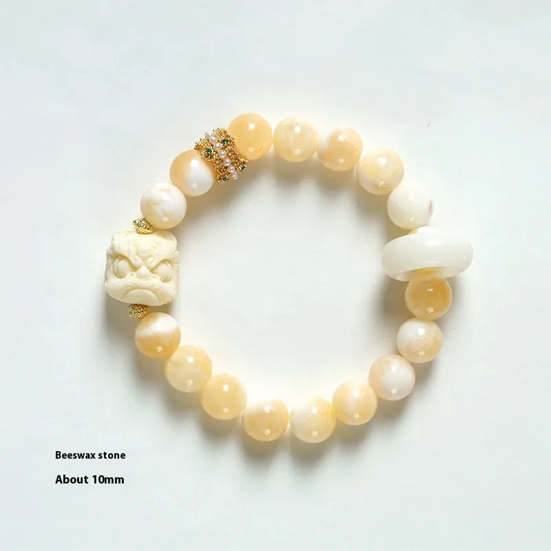 Hand-woven bracelet with 10mm round gray agate and mellite beads, Ivory Xingshi style, unisex design.