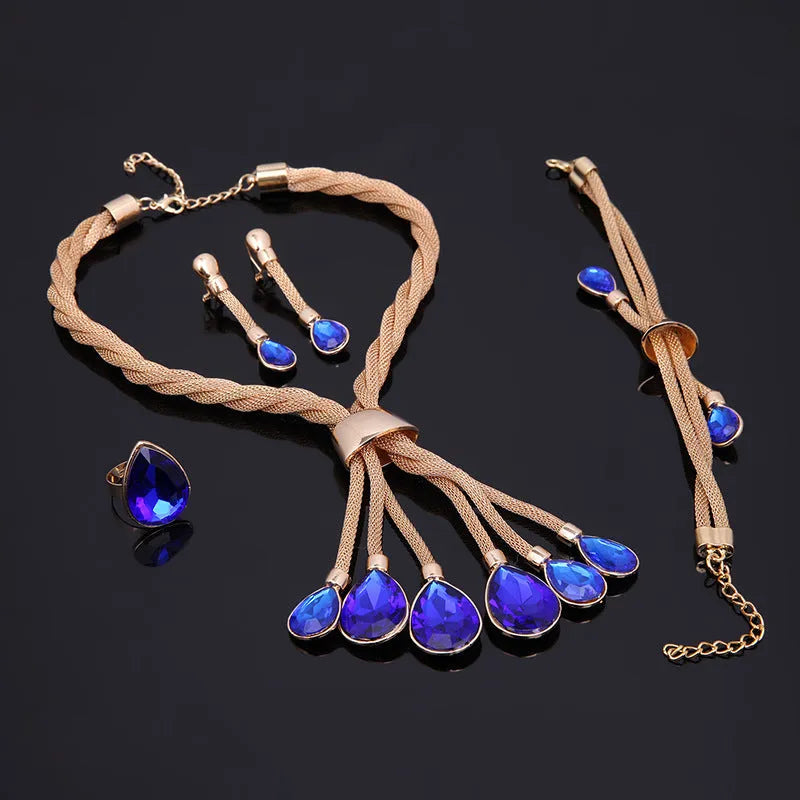 Four-piece gilded women's jewellery set with alloy diamond-finish square pattern, including necklace, earrings and bracelet in 18K gold colour