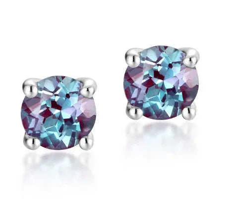 A pair of simple geometric silver ear studs with a round cultivated Alexandrite stone.