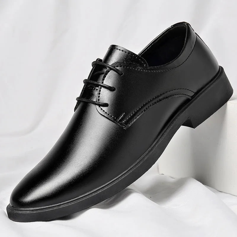 Men's black round toe pointed cap low top PU formal shoes with stitched detailing on white background