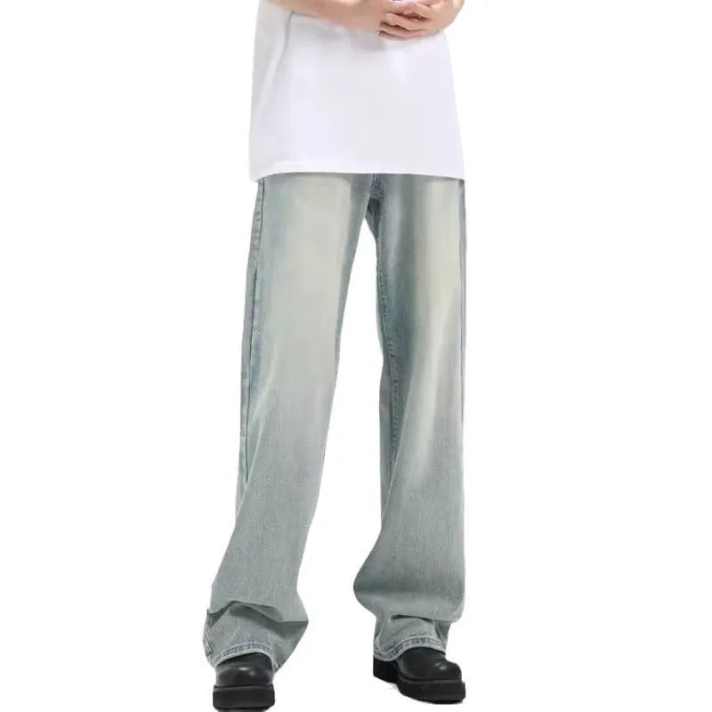 Blue retro-style loose casual trousers with an elastic waistband on a hanger.