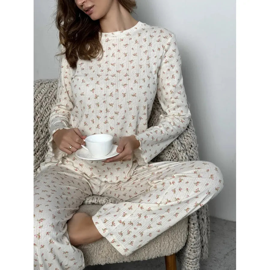 Women's white floral print two-piece suit with bell sleeve top and wide leg pants