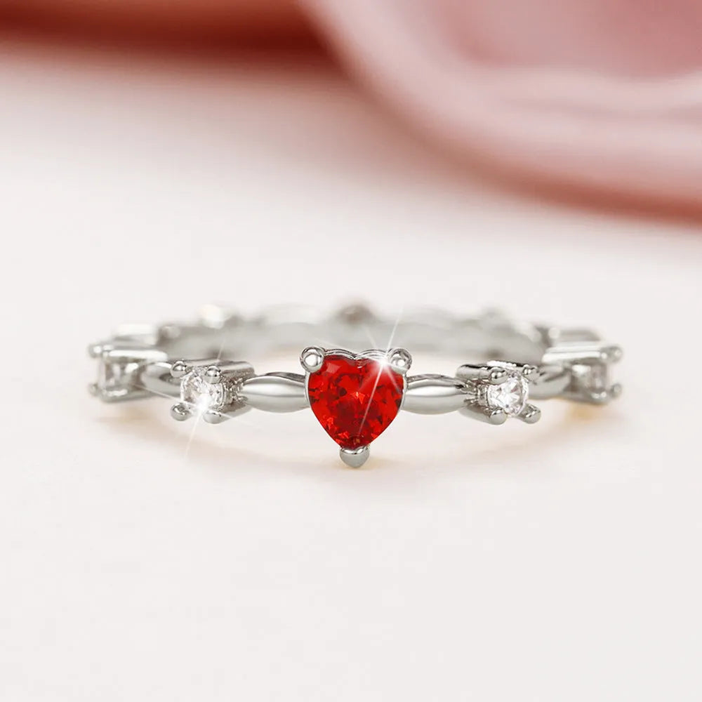 Gold or silver electroplated copper ring with peach heart charm and zircon detailing, sizes 6 to 10