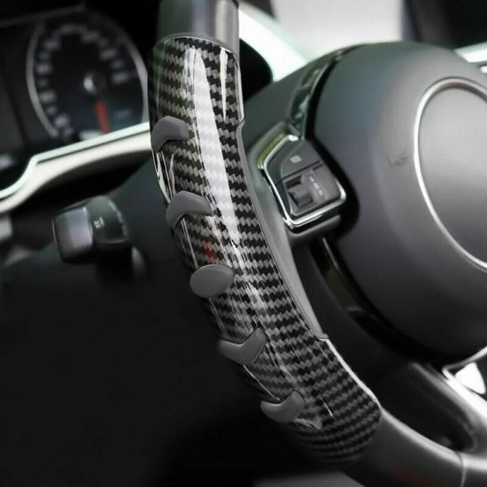 Carbon fibre black anti-slip steering wheel sleeve for 38cm diameter wheels.