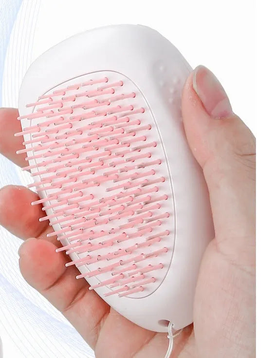 White pet hair brush for cats and dogs made of ABS plastic with compact dimensions 7.2 x 10.6 x 4.2 cm
