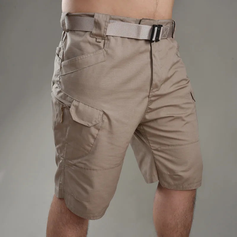 Men's khaki tactical shorts with button closure for hiking and outdoor work.