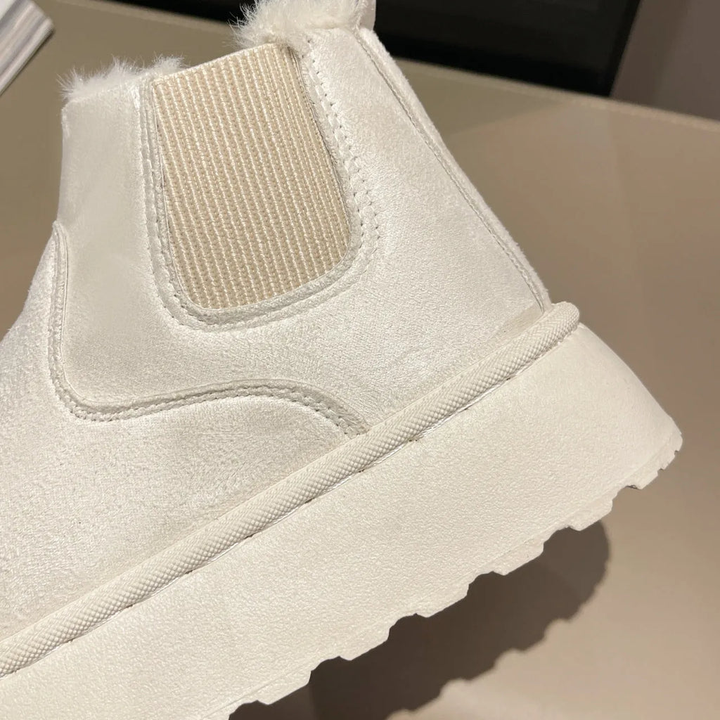 Women's plush snow boots in milky white with flat heel, round toe, faux PU upper, and short plush lining