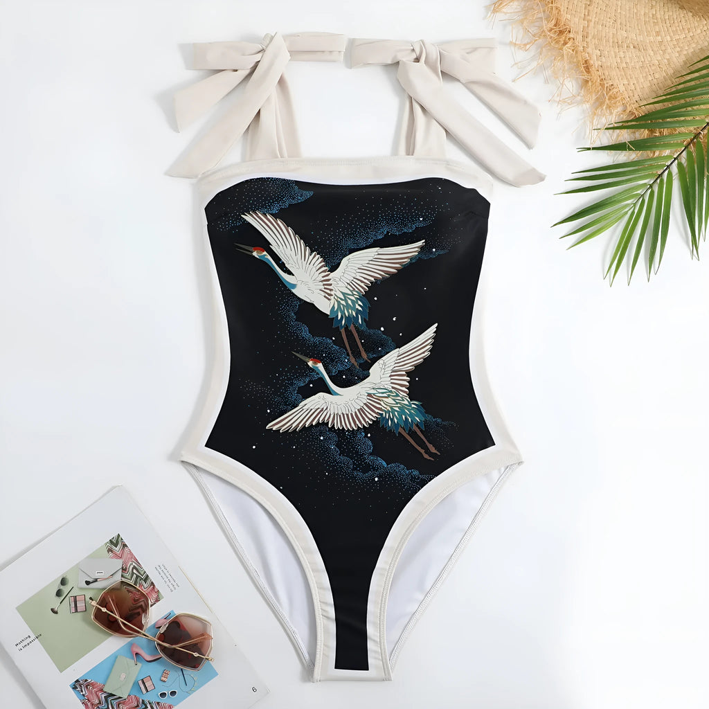 Women's retro floral one-piece swimsuit with a lightweight chiffon skirt.