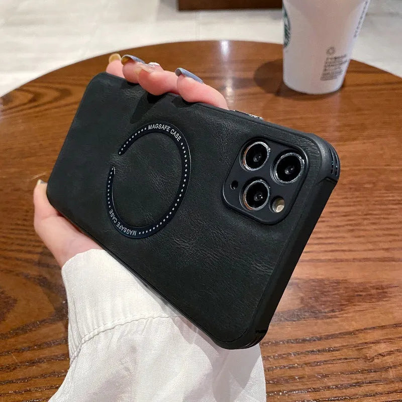 Black imitation leather magnetic charging case for iPhone on a magnetic car mount